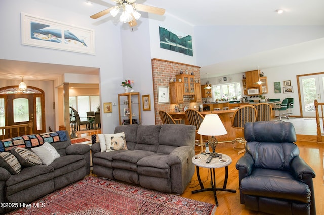17 Troon Dr, Pinehurst, NC 28374 - living room with high vaulted ceiling, healthy amount of natural light, ceiling fan, and light wood-style flooring