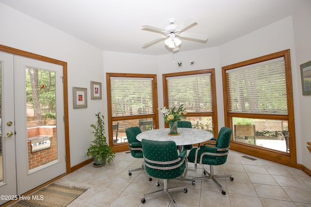 17 Troon Dr, Pinehurst, NC 28374 - dining area featuring light tile patterned floors, ceiling fan, and baseboards