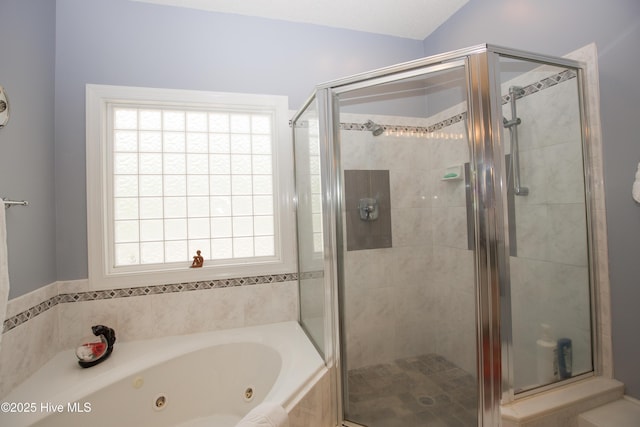 17 Troon Dr, Pinehurst, NC 28374 - bathroom featuring a tub with jets, a stall shower, plenty of natural light, and lofted ceiling