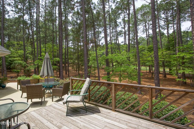 17 Troon Dr, Pinehurst, NC 28374 - deck featuring outdoor dining space