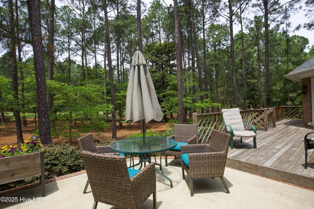 17 Troon Dr, Pinehurst, NC 28374 - view of patio / terrace featuring a deck and outdoor dining area