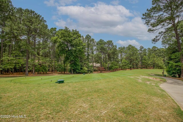 17 Troon Dr, Pinehurst, NC 28374 - view of green lawn featuring view of scattered trees