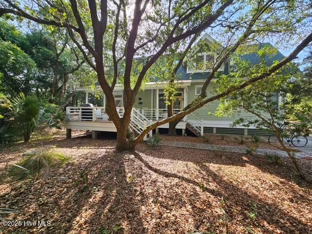 3 Sabal Palm Trl, Bald Head Island, NC 28461 - back of property featuring stairs and a wooden deck