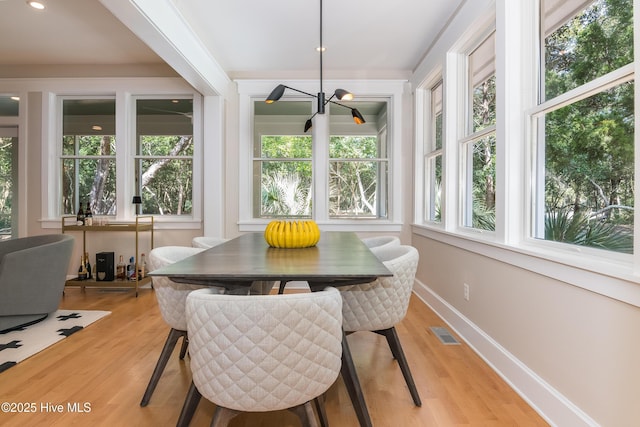 3 Sabal Palm Trl, Bald Head Island, NC 28461 - dining room featuring a chandelier, light wood-style floors, baseboards, and recessed lighting