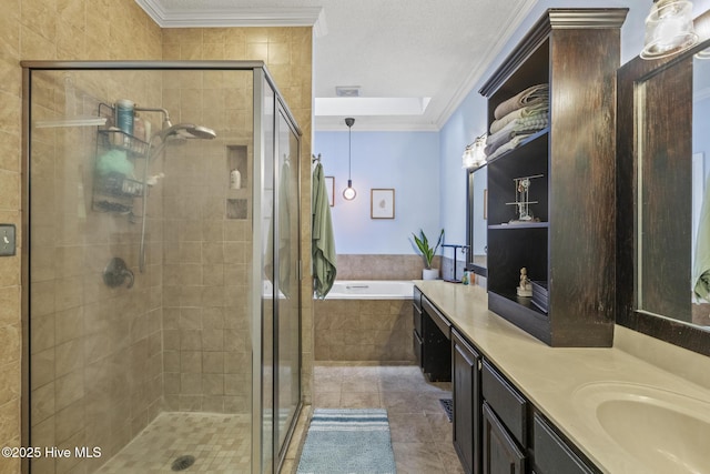full bath with ornamental molding, a shower stall, a garden tub, vanity, and tile patterned floors