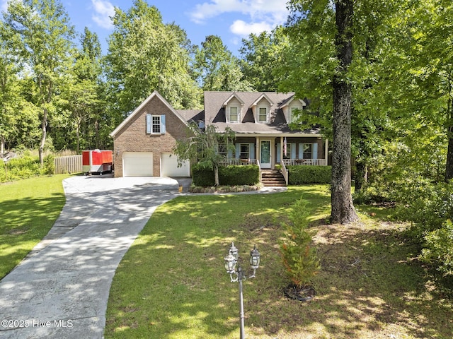 cape cod-style house featuring covered porch, driveway, a garage, and brick siding