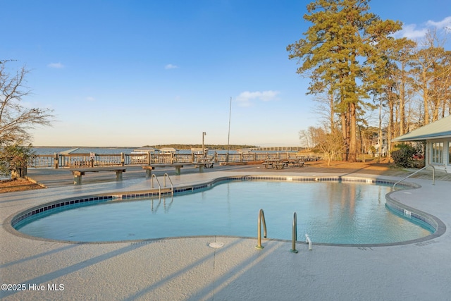 community pool featuring a patio area