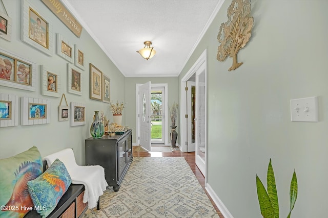 4713 Crosswinds Dr, Wilmington, NC 28409 - hallway with ornamental molding, wood finished floors, and baseboards