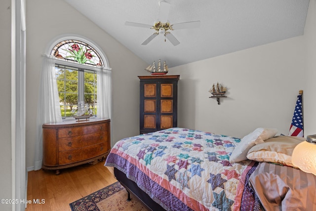 9333 Doris Dr, Oriental, NC 28571 - bedroom with lofted ceiling, light wood-style flooring, and ceiling fan