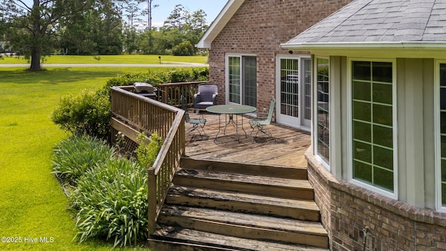 9333 Doris Dr, Oriental, NC 28571 - wooden deck with a lawn