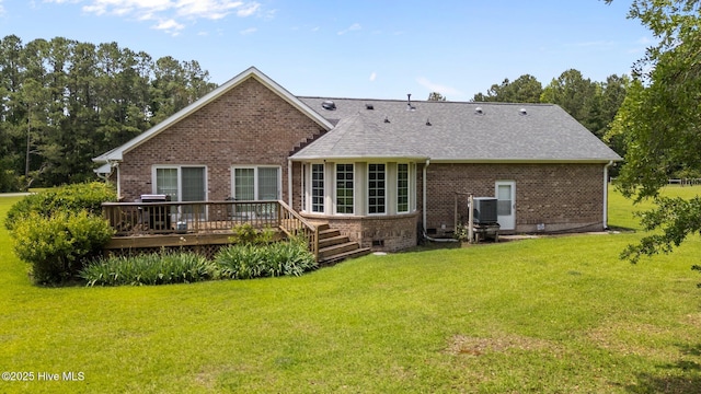 9333 Doris Dr, Oriental, NC 28571 - back of house with brick siding, a deck, a lawn, and a shingled roof