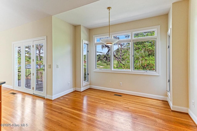 20 Shenecossett Ln, Pinehurst, NC 28374 - unfurnished dining area with light wood-style floors and baseboards