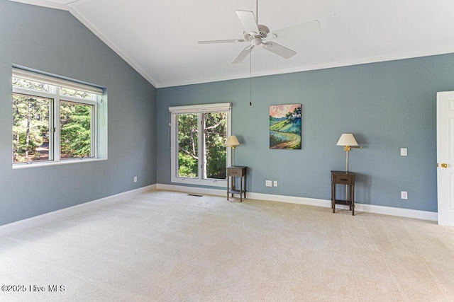 20 Shenecossett Ln, Pinehurst, NC 28374 - carpeted spare room featuring lofted ceiling, plenty of natural light, ceiling fan, and baseboards