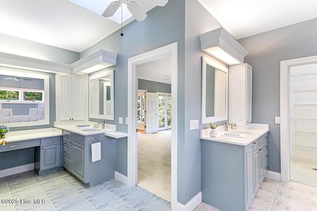 20 Shenecossett Ln, Pinehurst, NC 28374 - bathroom featuring ceiling fan, baseboards, and two vanities