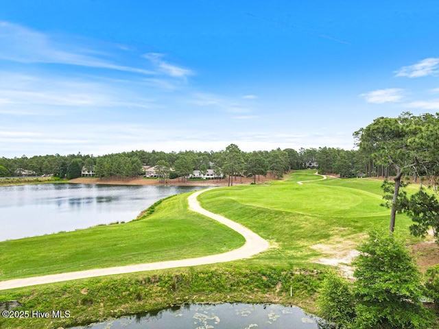 20 Shenecossett Ln, Pinehurst, NC 28374 - view of home's community with golf course view, a water view, view of wooded area, and a lawn