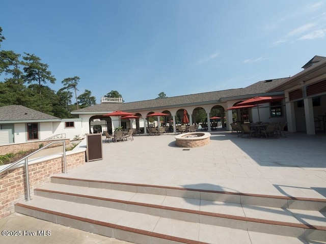 20 Shenecossett Ln, Pinehurst, NC 28374 - view of pool with a patio, outdoor dining space, and a fire pit