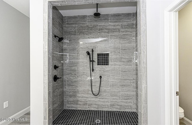 131 Putters Ln, Pinetops, NC 27864 - bathroom with toilet, a stall shower, and baseboards