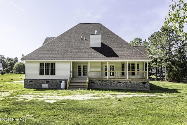 131 Putters Ln, Pinetops, NC 27864 - rear view of property featuring french doors, crawl space, a yard, and roof with shingles