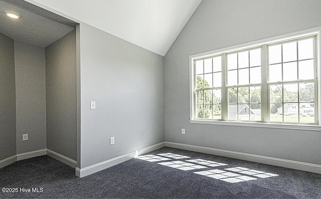 131 Putters Ln, Pinetops, NC 27864 - empty room featuring dark carpet, lofted ceiling, baseboards, and recessed lighting