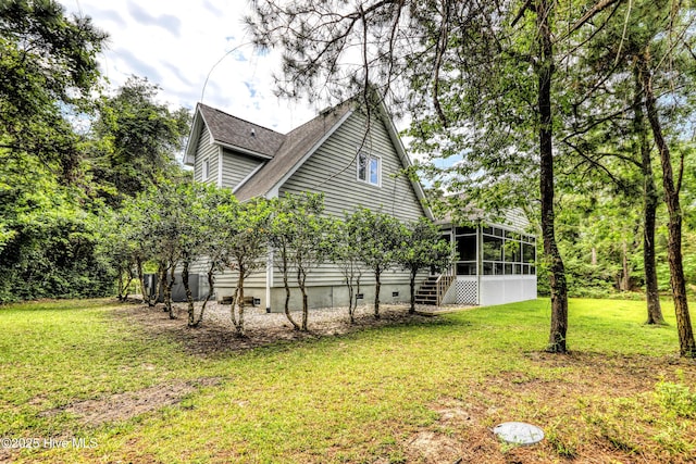 107 Live Oak Ct, Pine Knoll Shores, NC 28512 - view of side of home featuring a sunroom, a yard, and stairs