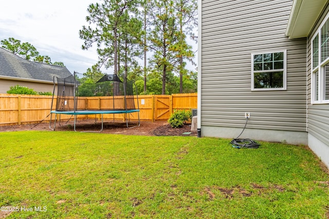 view of yard featuring a trampoline