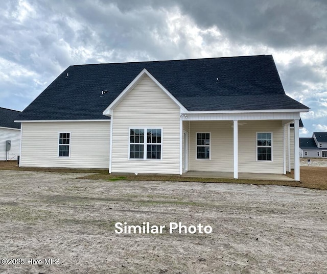 754 Secession Ln, Jacksonville, NC 28546 - rear view of property featuring covered porch and a shingled roof