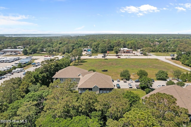 drone / aerial view of a heavily wooded area