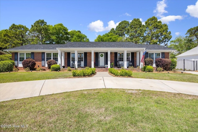 125 Windemere Rd, Wilmington, NC 28405 - ranch-style house with brick siding and covered porch