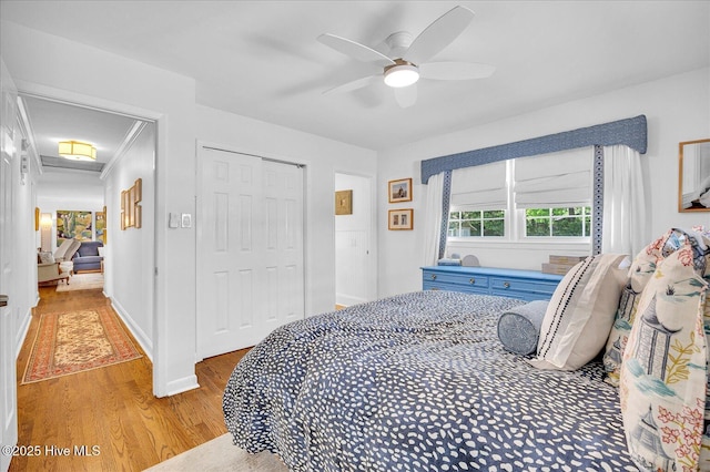 125 Windemere Rd, Wilmington, NC 28405 - bedroom featuring light wood-type flooring, a closet, and ceiling fan