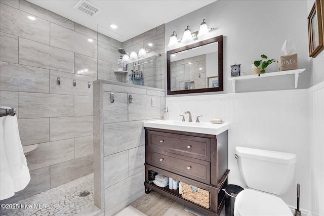 125 Windemere Rd, Wilmington, NC 28405 - full bath featuring walk in shower, vanity, and wainscoting