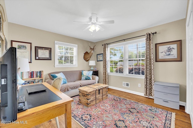125 Windemere Rd, Wilmington, NC 28405 - living area with ceiling fan and wood finished floors