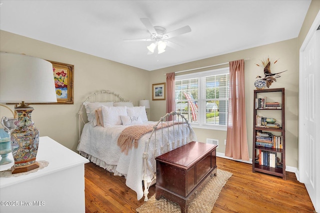 125 Windemere Rd, Wilmington, NC 28405 - bedroom with wood finished floors and a ceiling fan