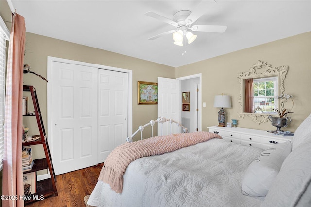 125 Windemere Rd, Wilmington, NC 28405 - bedroom with a closet, dark wood finished floors, and a ceiling fan
