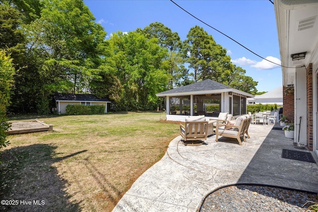 125 Windemere Rd, Wilmington, NC 28405 - view of grassy yard with a gazebo, a patio, an outdoor hangout area, and an outbuilding