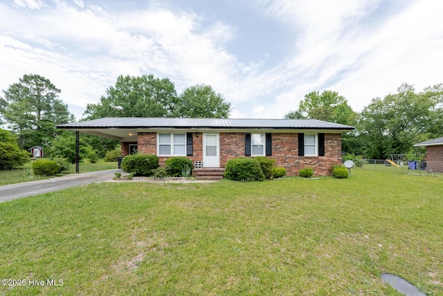 608 Richardson St, Elizabethtown, NC 28337 - ranch-style home featuring brick siding, driveway, and an attached carport