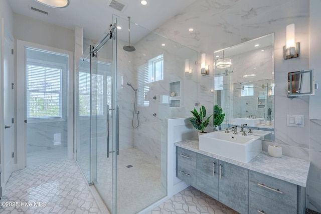 1326 Tidalwalk Dr, Wilmington, NC 28409 - full bathroom with a stall shower, vanity, recessed lighting, and marble finish flooring