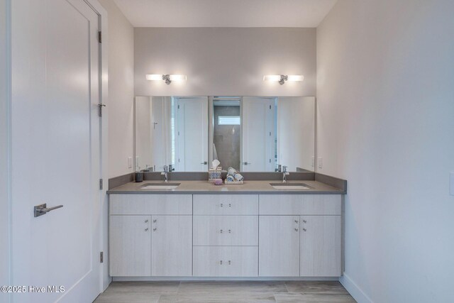 1326 Tidalwalk Dr, Wilmington, NC 28409 - full bathroom with double vanity and baseboards