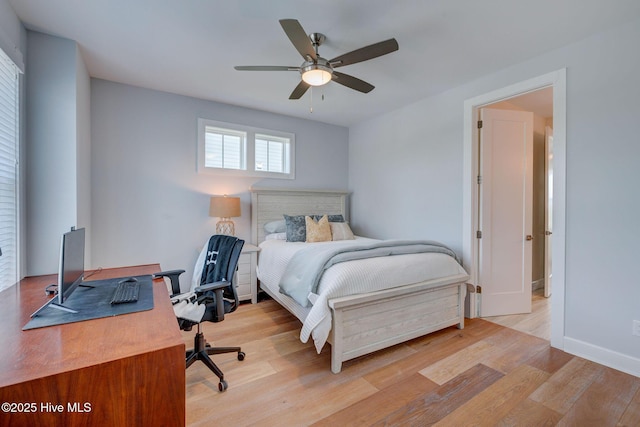 1326 Tidalwalk Dr, Wilmington, NC 28409 - bedroom with wood finished floors, an office area, baseboards, and a ceiling fan