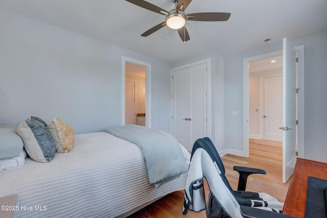 1326 Tidalwalk Dr, Wilmington, NC 28409 - bedroom with wood finished floors, a closet, baseboards, and ceiling fan