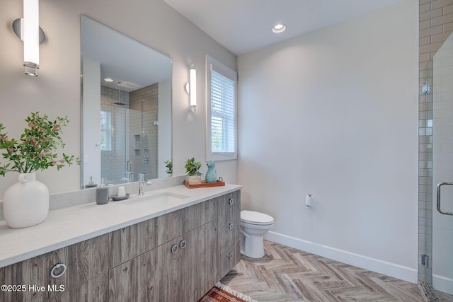 1326 Tidalwalk Dr, Wilmington, NC 28409 - bathroom with a shower stall, baseboards, vanity, toilet, and recessed lighting