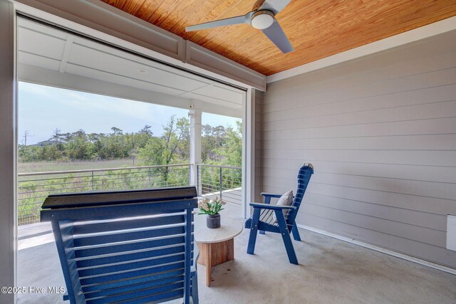 1326 Tidalwalk Dr, Wilmington, NC 28409 - view of patio with a ceiling fan and a balcony