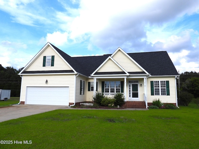 644 Milton Dr, Winterville, NC 28590 - view of front of house featuring a porch, a front lawn, concrete driveway, a garage, and a shingled roof