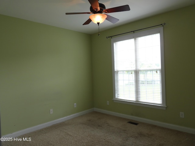 644 Milton Dr, Winterville, NC 28590 - unfurnished room with healthy amount of natural light, baseboards, ceiling fan, and carpet flooring