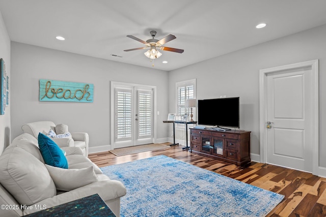 1218 Pinfish Ln, Carolina Beach, NC 28428 - living area featuring ceiling fan, wood finished floors, baseboards, recessed lighting, and french doors