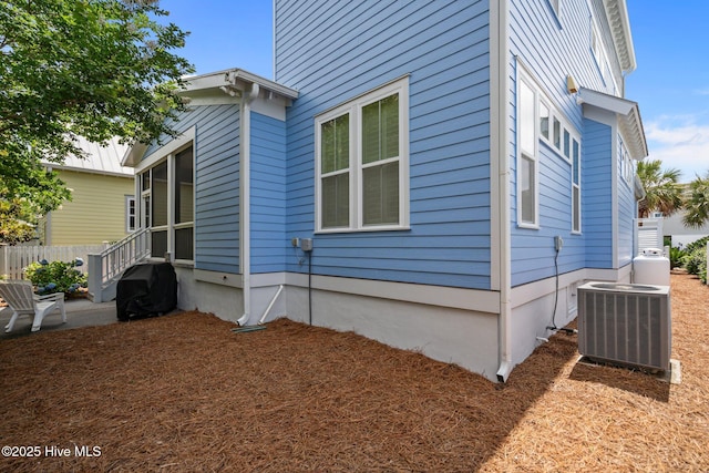 1218 Pinfish Ln, Carolina Beach, NC 28428 - view of property exterior featuring central air condition unit