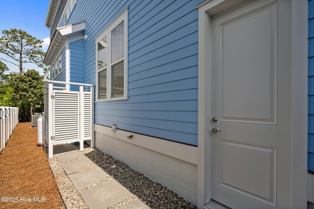 1218 Pinfish Ln, Carolina Beach, NC 28428 - property entrance with central air condition unit