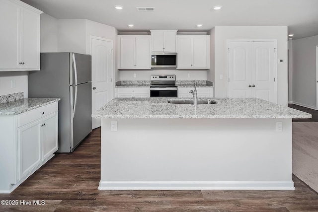 1406 Judith Dr SE, Bolivia, NC 28422 - kitchen with appliances with stainless steel finishes, a sink, light stone counters, an island with sink, and recessed lighting