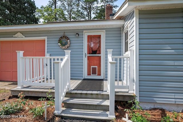 2285 Old Pamlico Beach Rd W, Belhaven, NC 27810 - entrance to property featuring a chimney and a garage