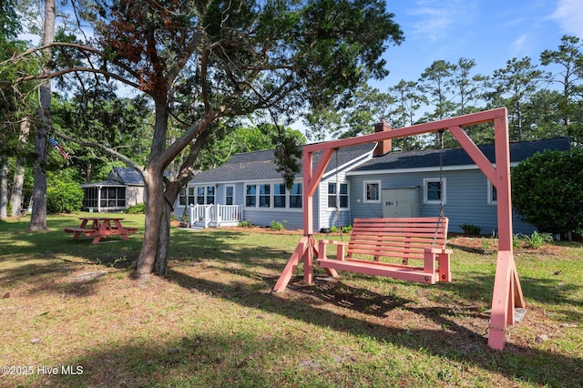 2285 Old Pamlico Beach Rd W, Belhaven, NC 27810 - back of property with a chimney and a yard