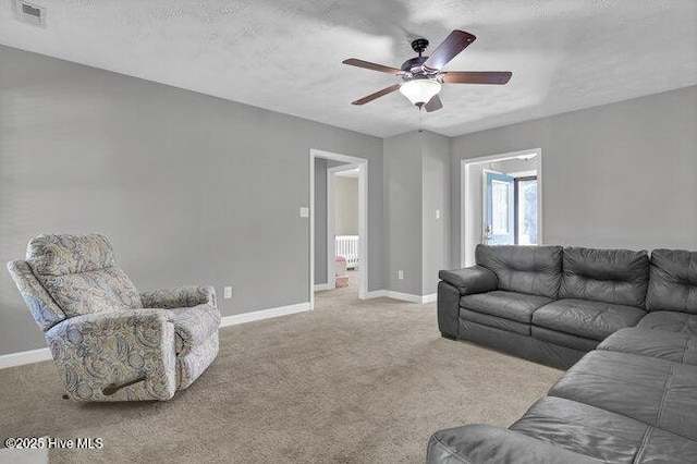 102 Rocky Ct, Richlands, NC 28574 - carpeted living room featuring ceiling fan and baseboards